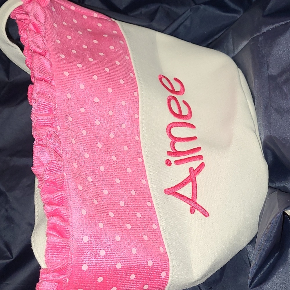 Bag embroidered with "Aimee" bottom & strap looks like white linen. Plush pink